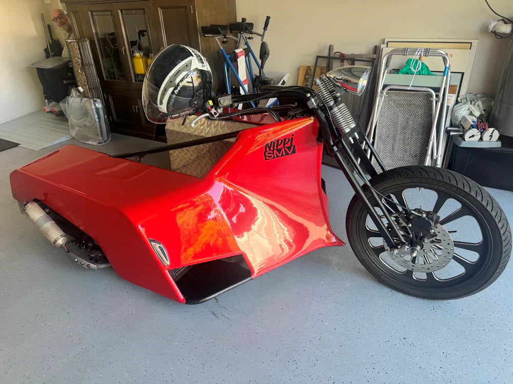 Andy's custom wheelchair motorbike in garage